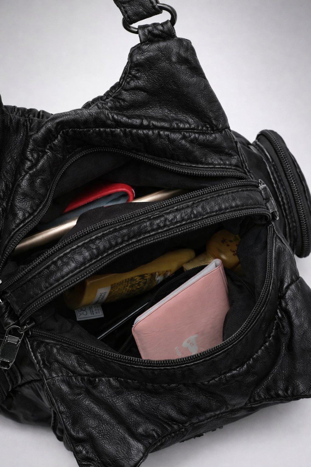 Black compact shoulder handbag for school