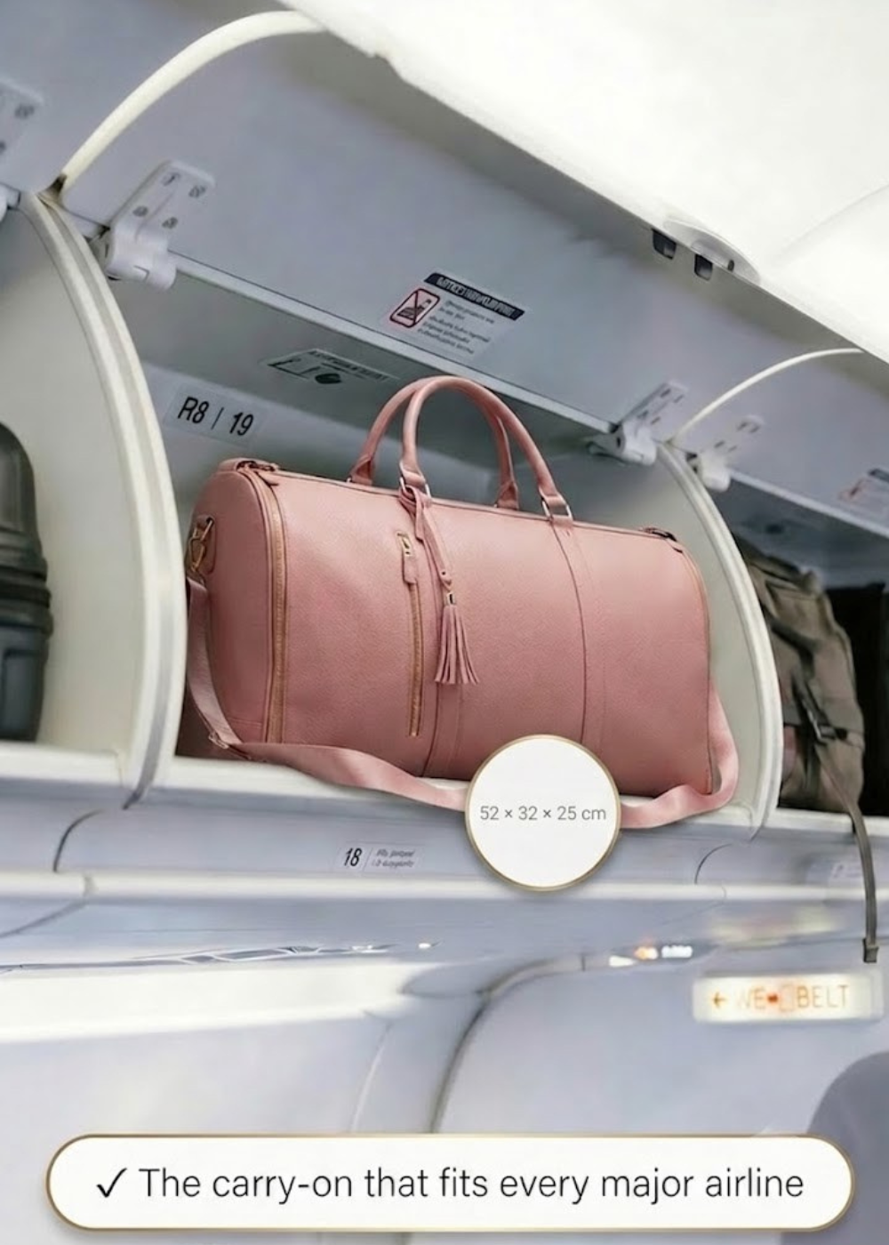 Pink duffel bag in an airplane overhead compartment with text indicating it fits major airlines.
