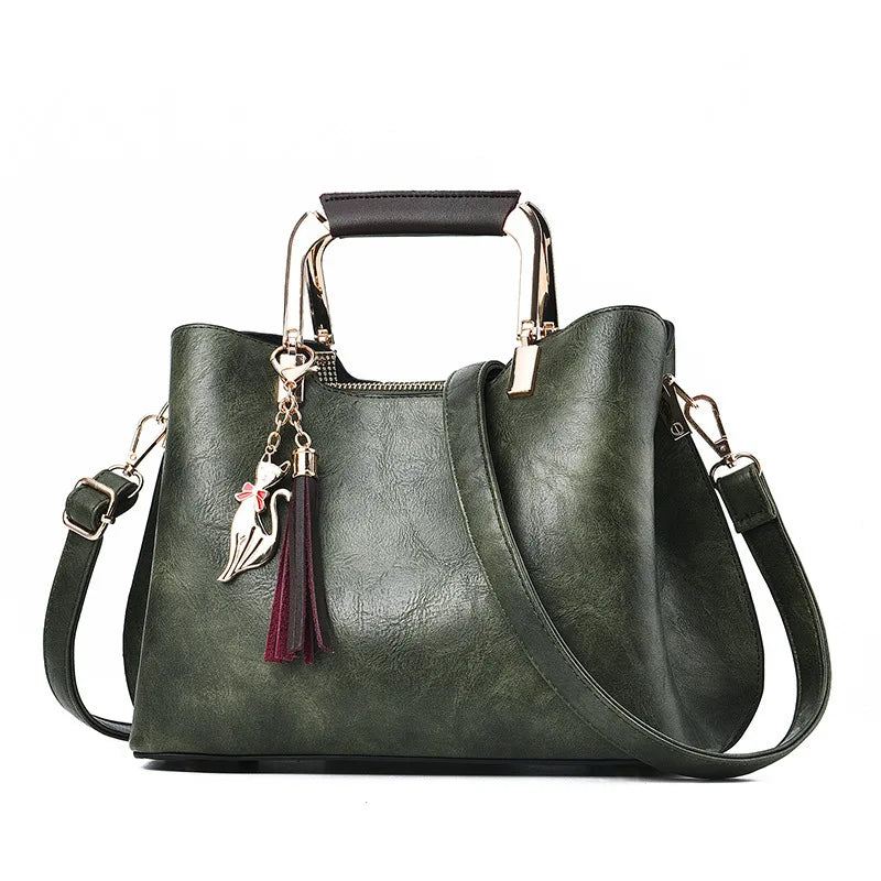 Metal Handle Tassel Satchel | Seville